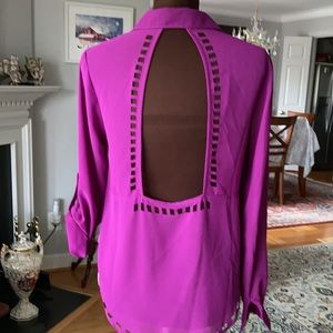 Very unique Cut out blouse with a surprise